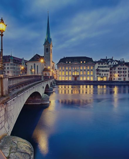 view on Fraumunster Church and Church of St. Peter at night, Zurich, Switzerland